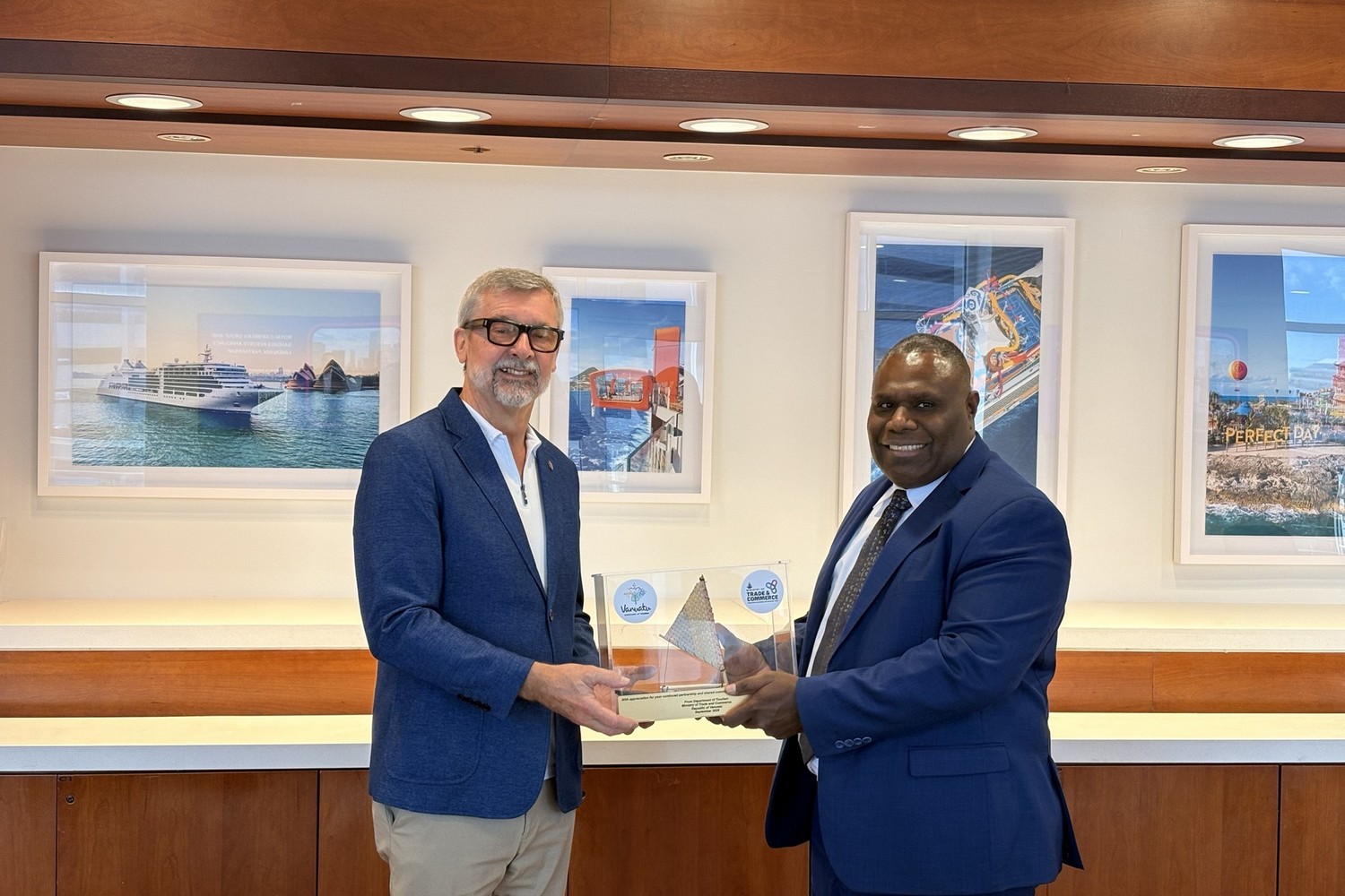 The Honorable Minister of Trade and Commerce, Robson Iavro, presenting a traditional kenu to Mr. Michael Bayley, President and Chief Executive Officer of Royal Caribbean, at the company’s headquarters in Miami, Florida, 28 September 2026.